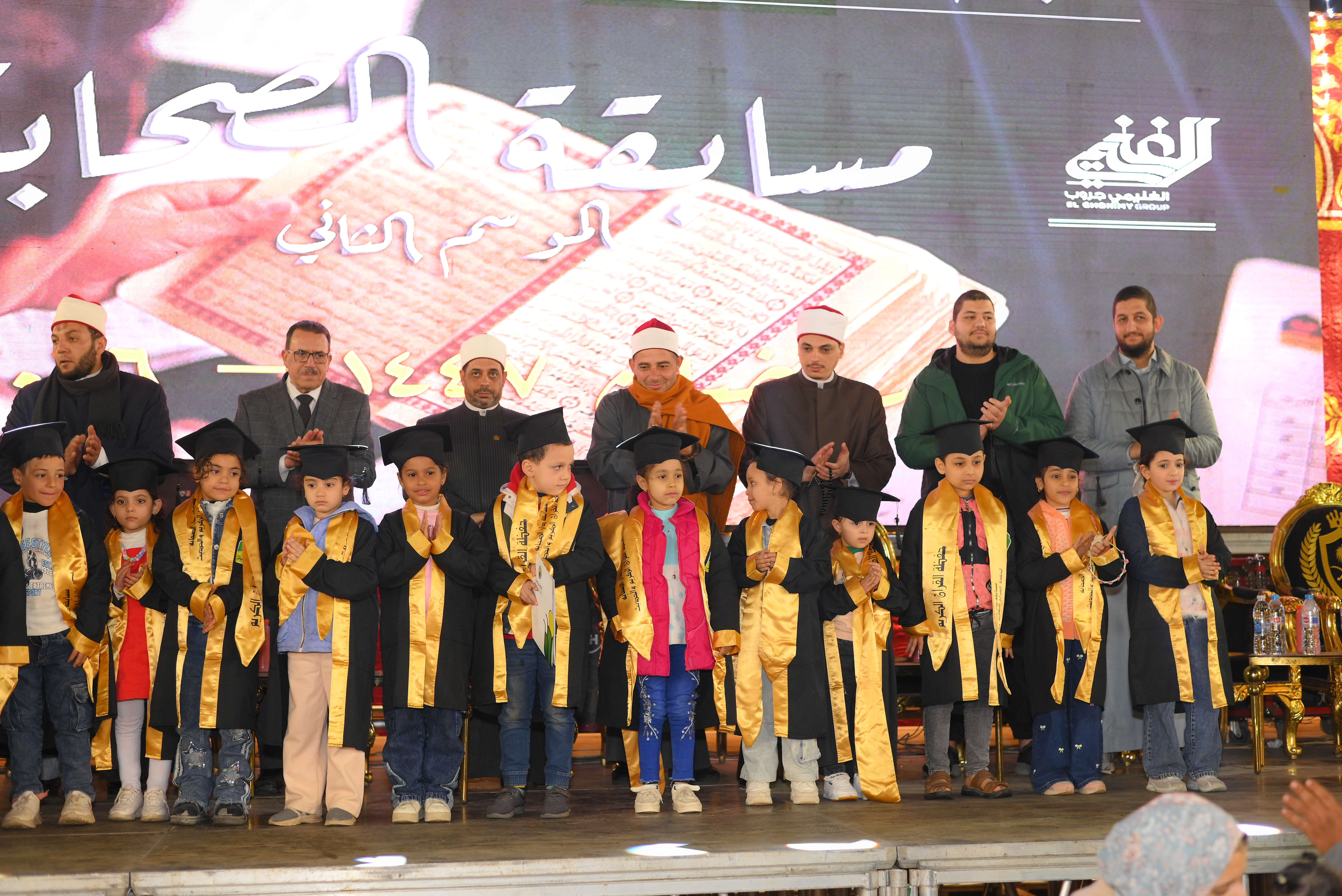 Young winners with scholars and organizers